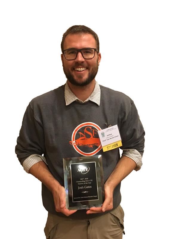  Chief Ivan Blunka Teacher Josh Gates holds his award for New CTE Teacher of the Year.